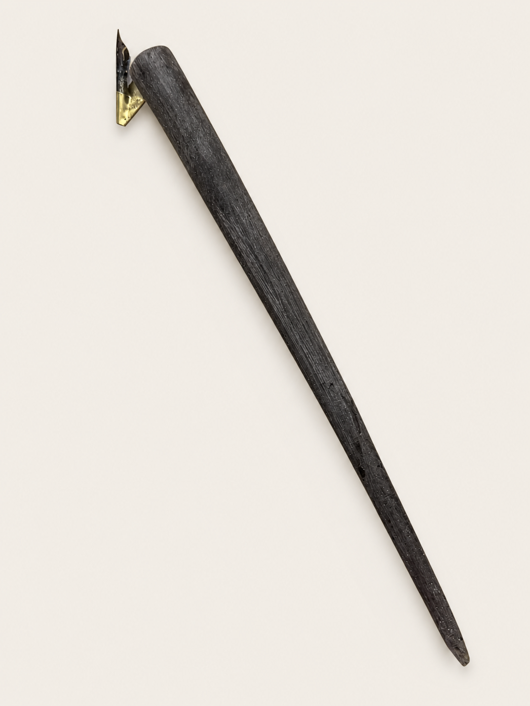 Black flat-bodied oblique holder prototype used to test flange position and writing angle