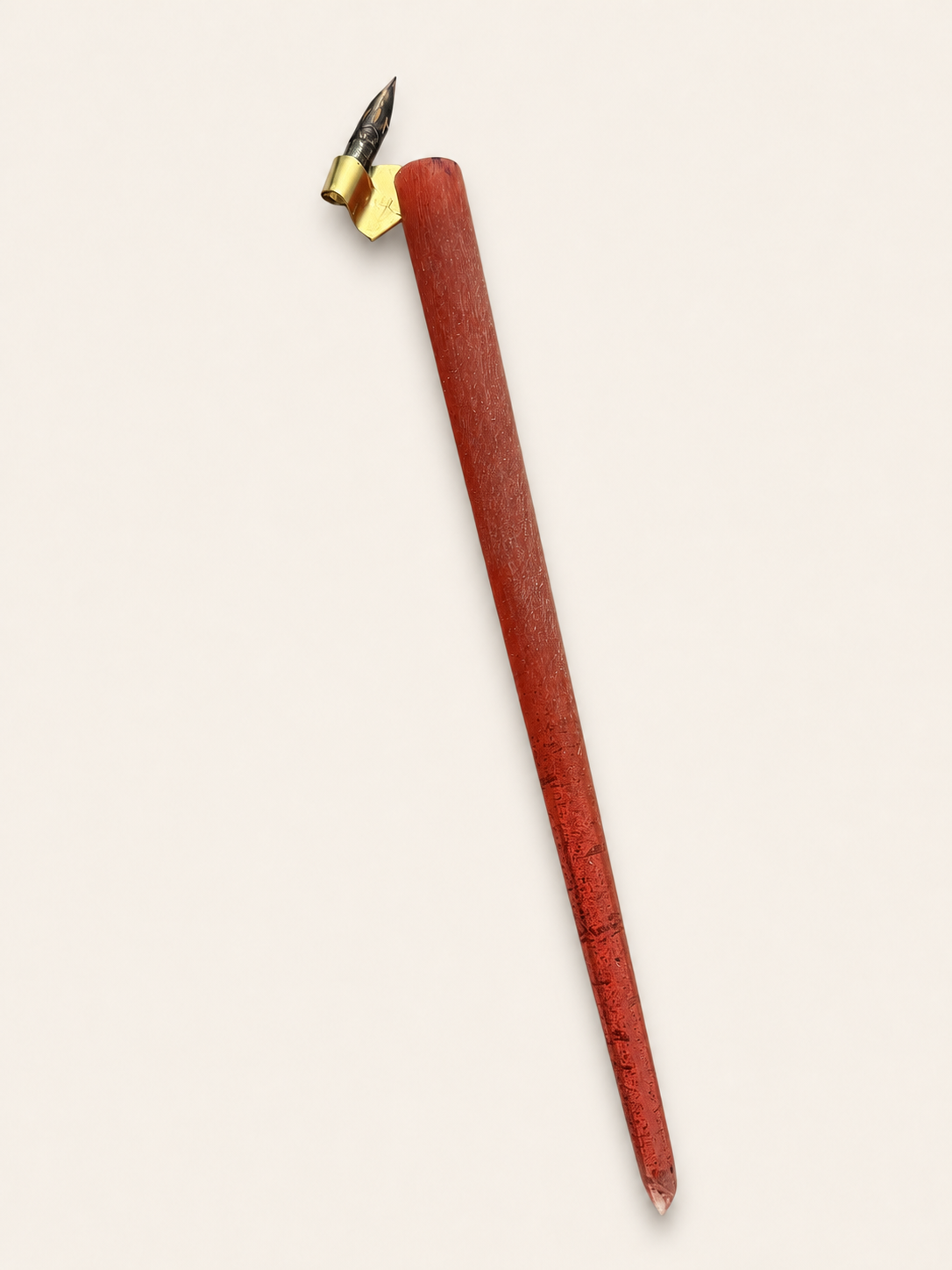 Red flat-bodied oblique holder prototype with brass flange, first full view