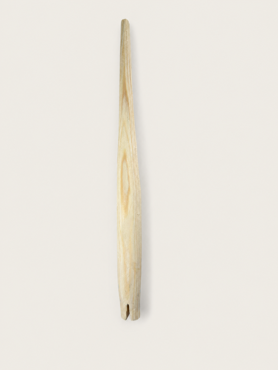 Smooth tapered wooden handle form used during oblique pen holder development