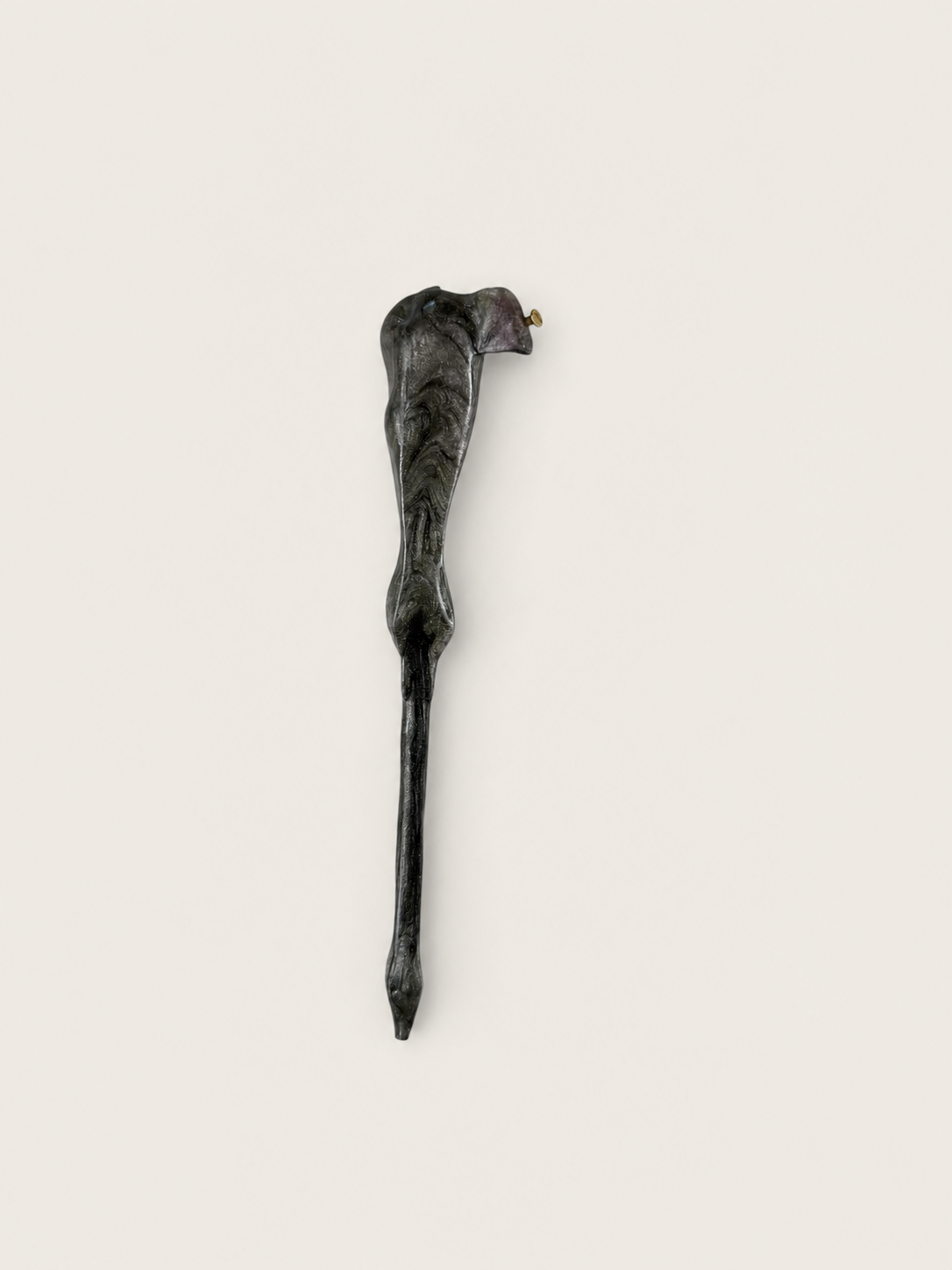 Second full view of a dark marbled oblique pen holder research prototype